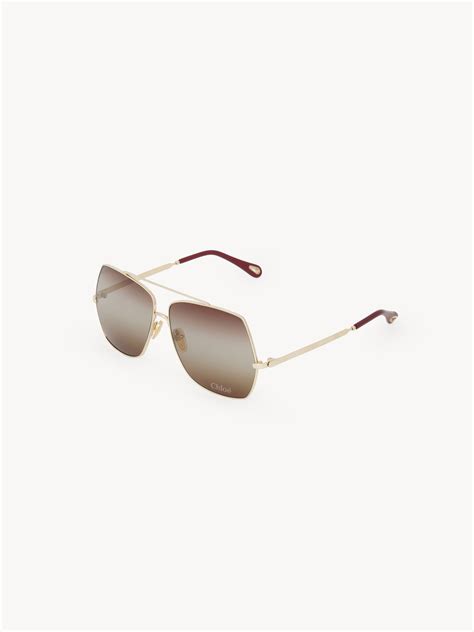 Chloé: Gold Aly Sunglasses .